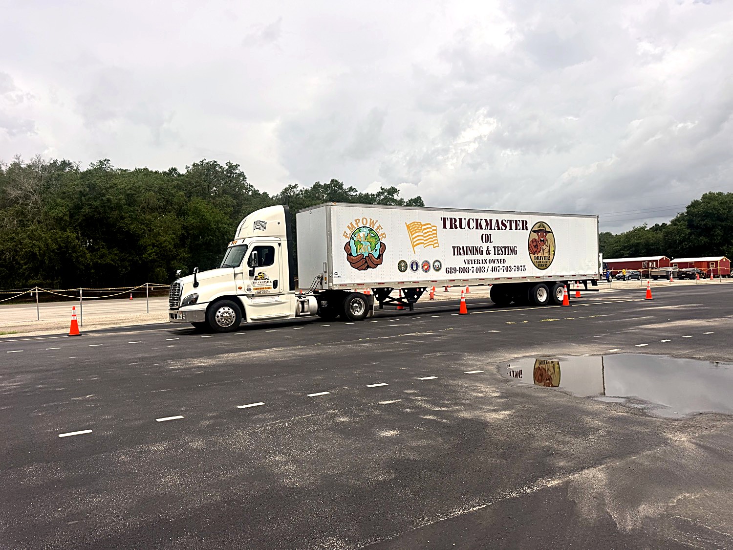 TruckMaster CDL Training & Testing veteran-owned tractor-trailer on the training pad in Apopka, FL